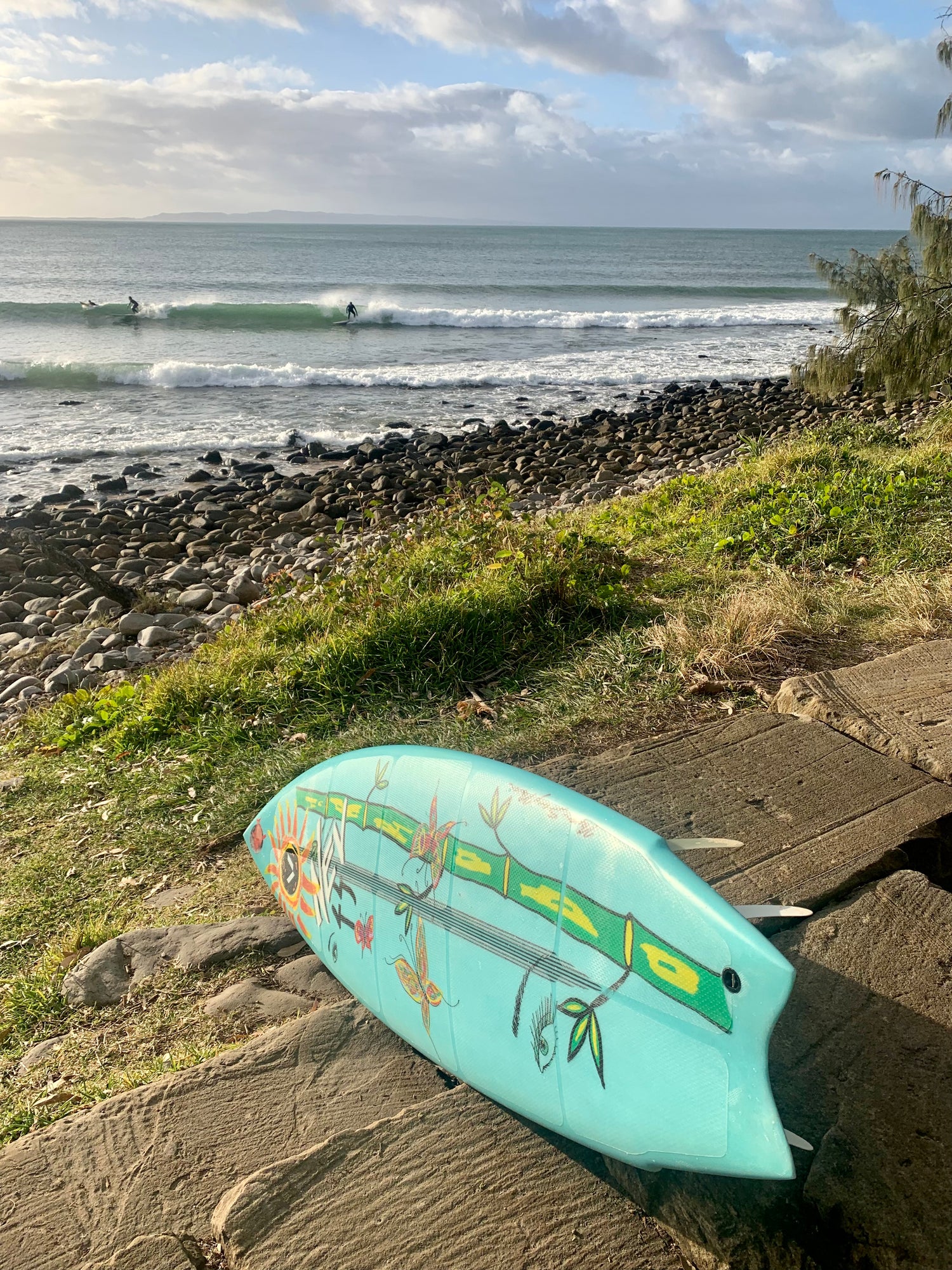 Supadex's own surfboard with Supadex Original Traction Pads applied, ready for a surf in the ocean.